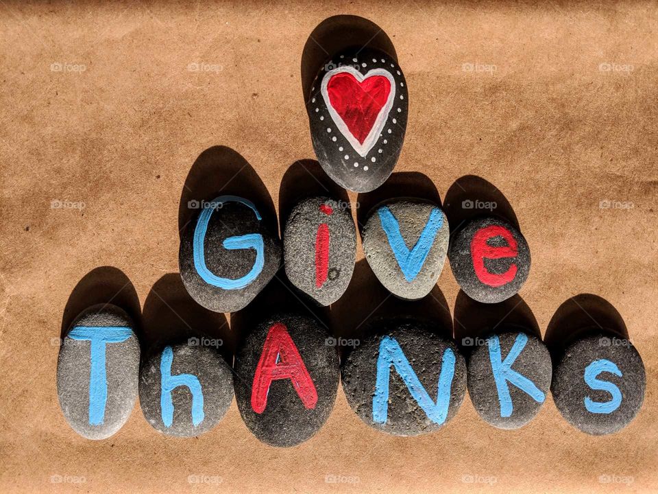 give thanks spelled out on stones