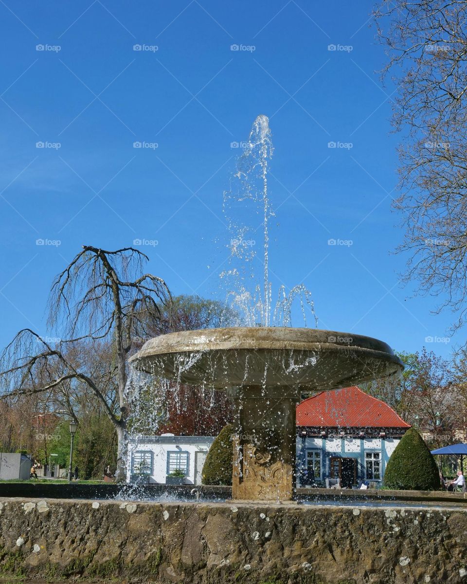 Water fountain against sky