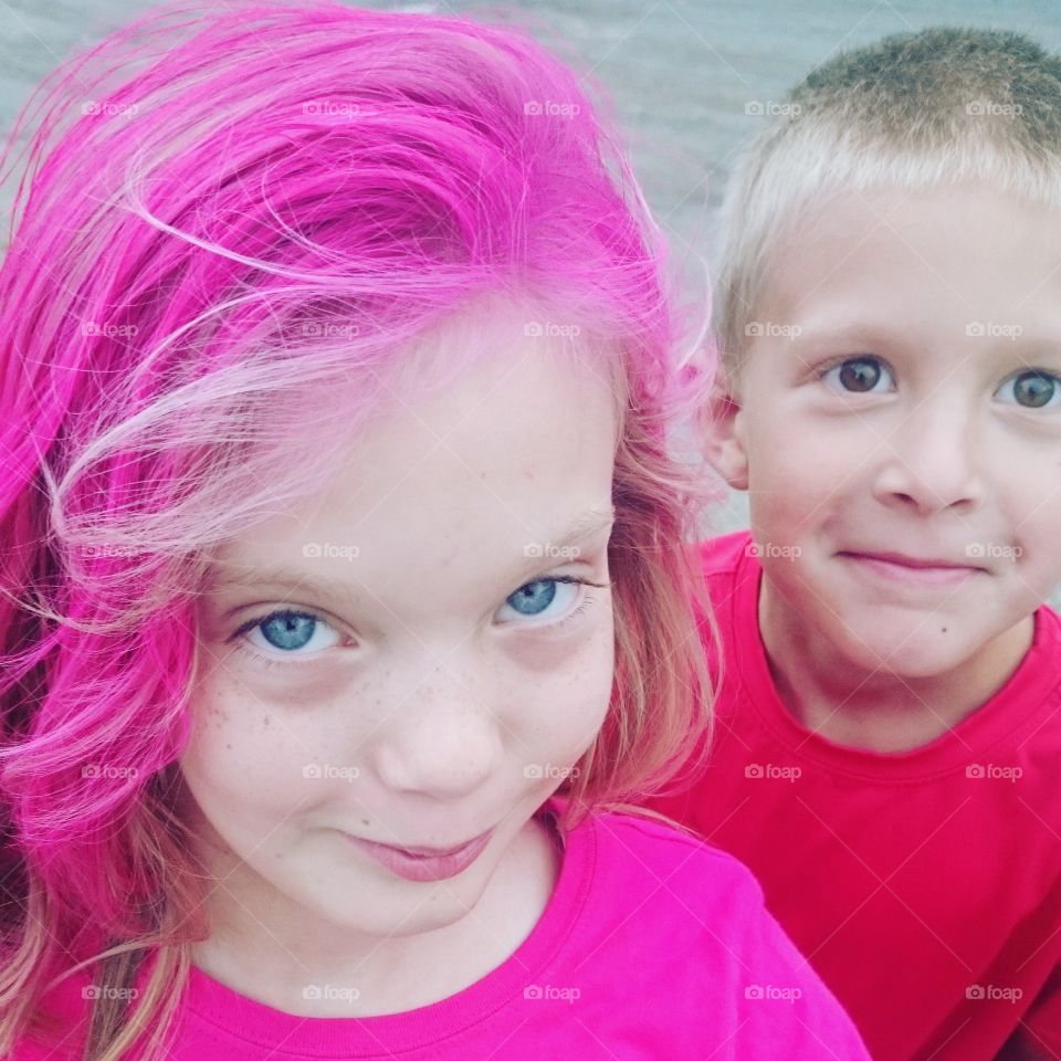 Pink hair girl with her brother