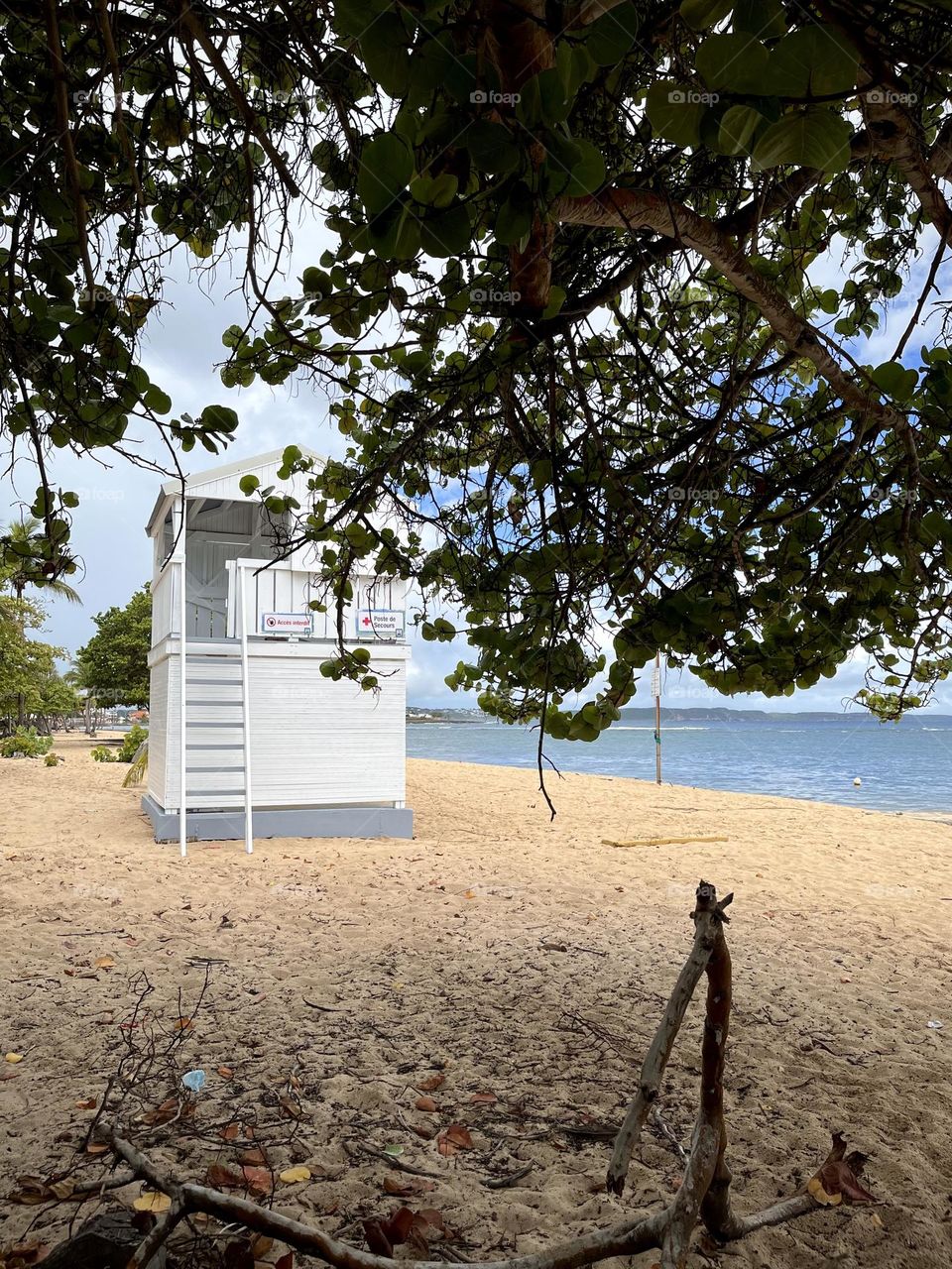 White first aid station on a Caribbean beach