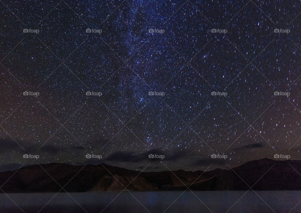 starry nights by the lake and mountain