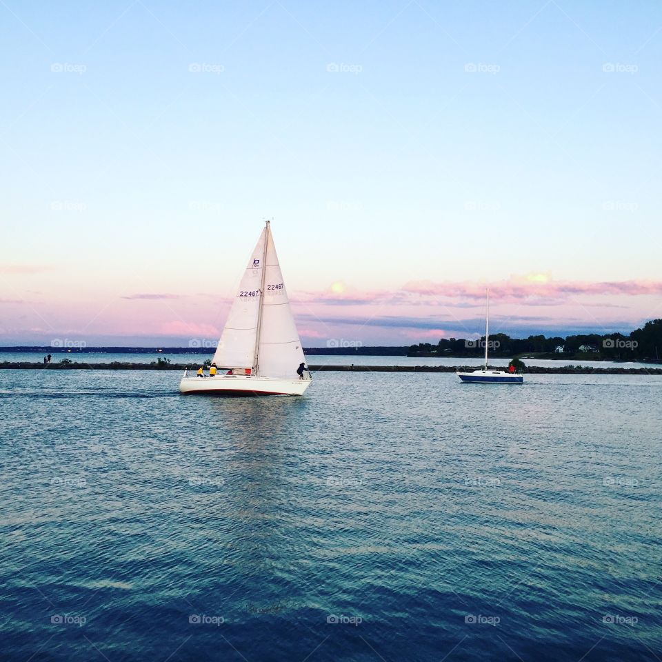 Sailboat on the Genesee River inlet, Rochester, NY.