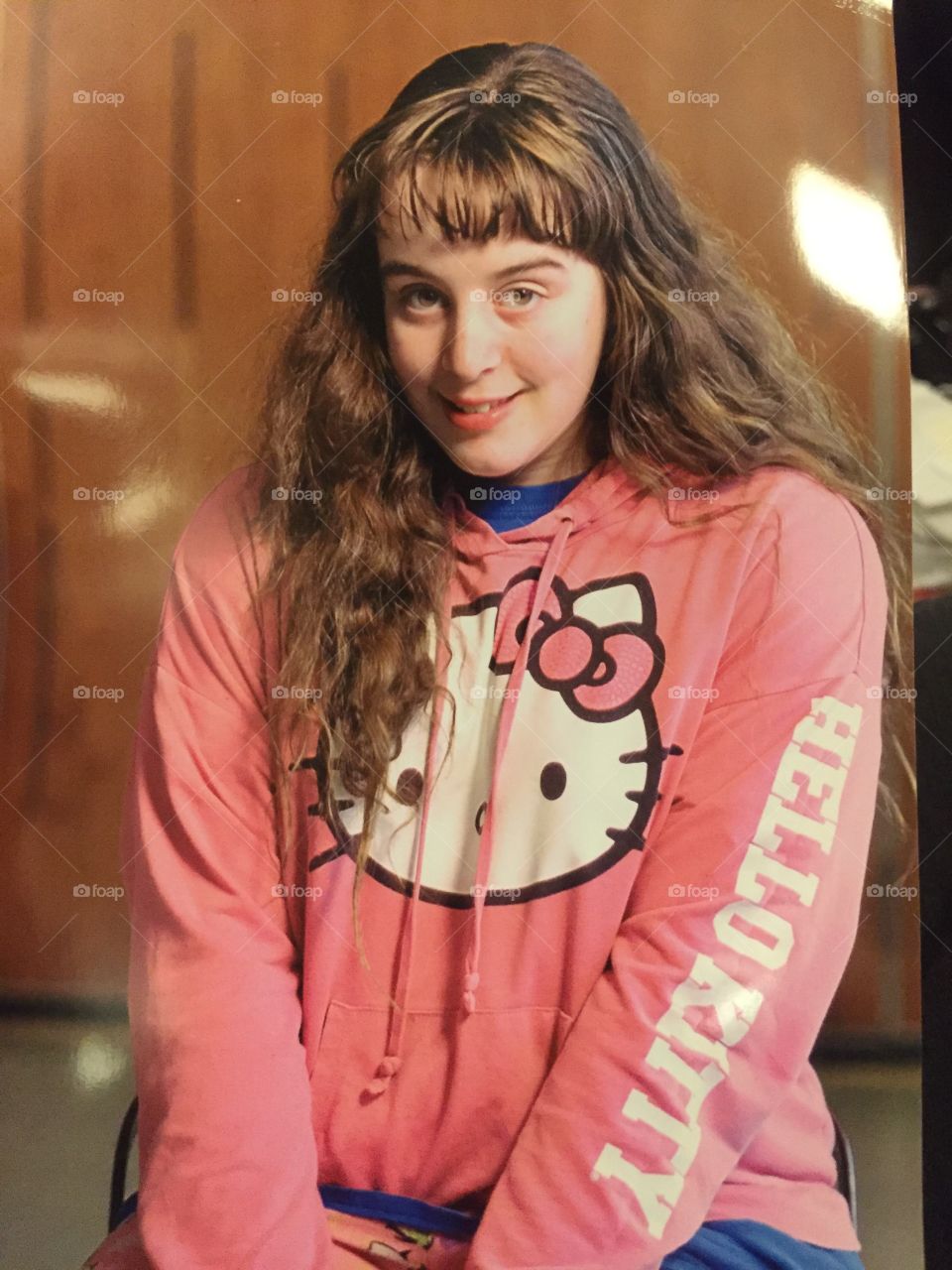 Girl with hello kitty sweatshirt