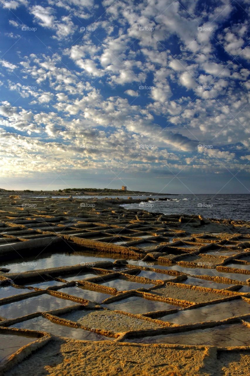 The saltpans of Bahar ic-Caghaq in the little island of Malta, found in the Mediterranean Sea.