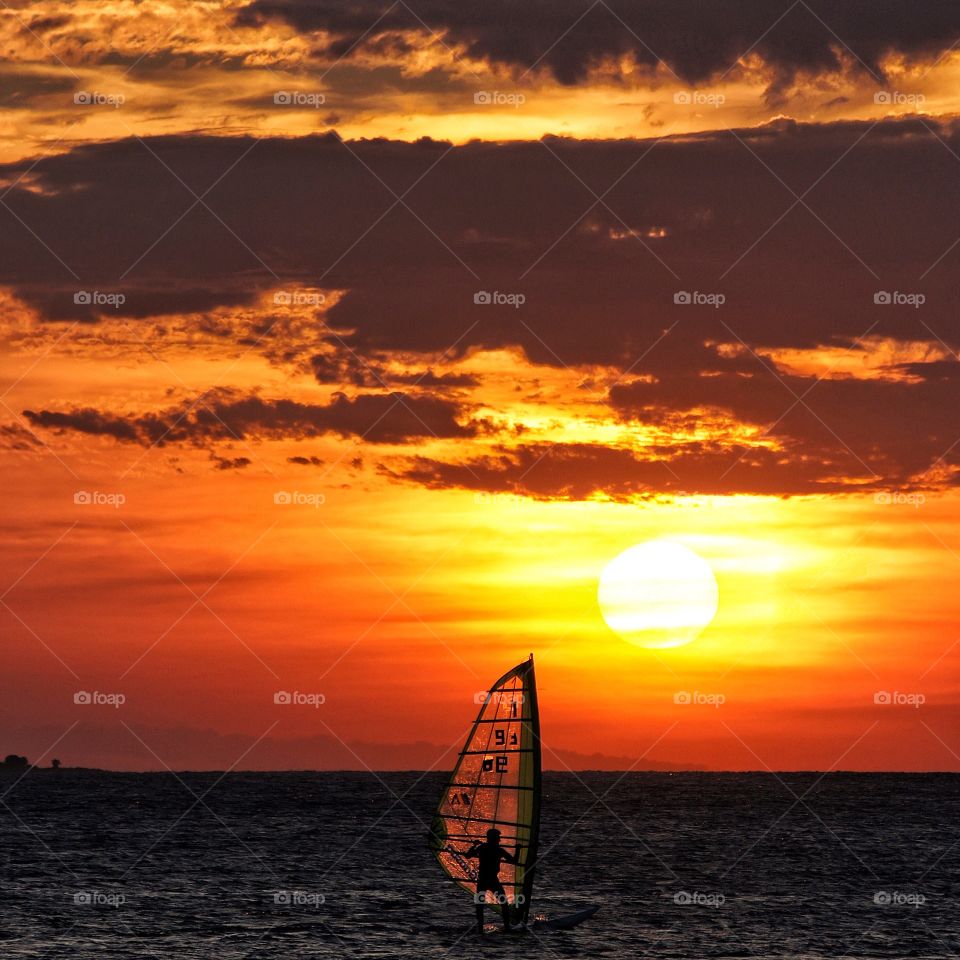 Windsurfing in sunset