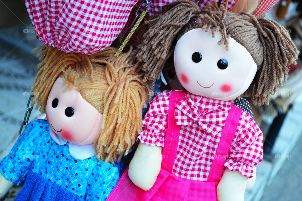 Beautiful and colorful artisanal dolls in a souvenirs shop