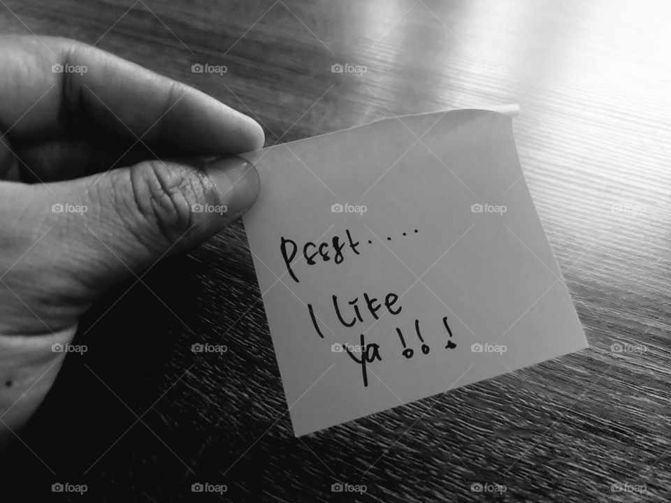 Motivational quotes on a small piece of paper