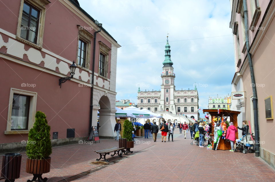 Old city with  baroque Town Hall in background, great symbol of the Zamość city in Poland
