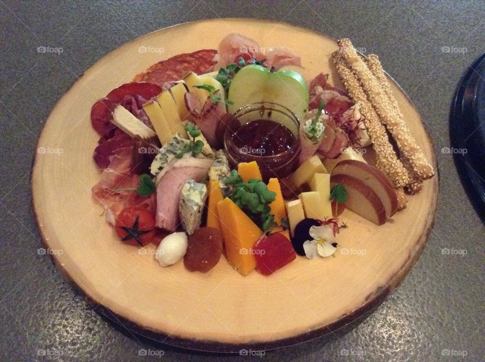 Cold meat and cheese platter.