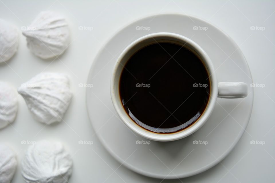 coffee cup with sweets white background top view