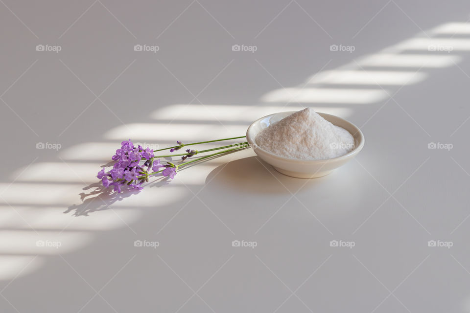 Collagen powder and lavender in the morning light.