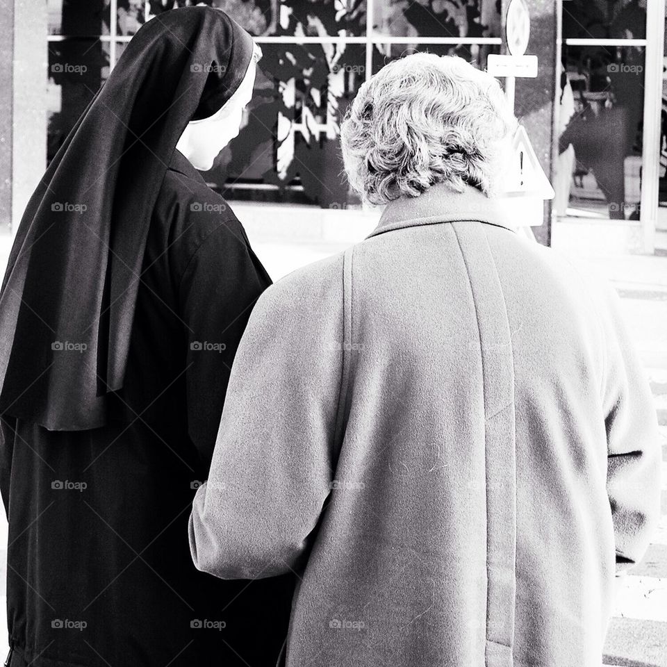 Nun helping, religion, people,documentary, black and white