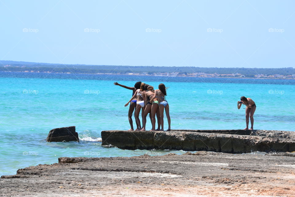 young people on the beach having fun