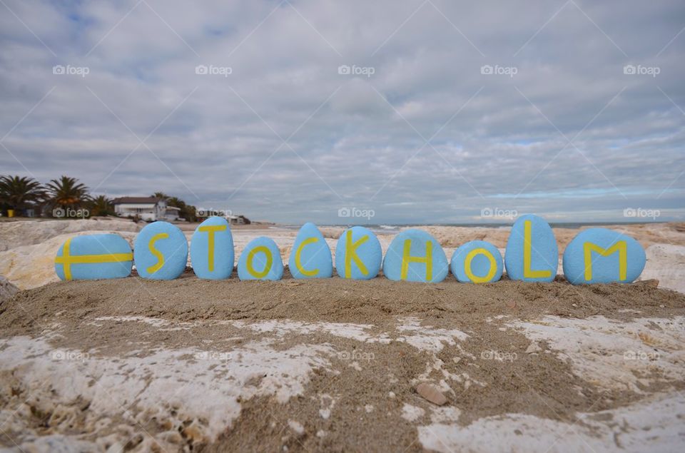 Stockholm concept on stones with swedish colours