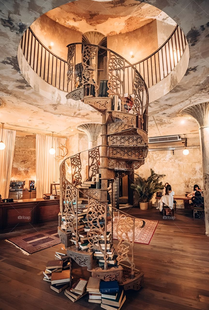 Spiral staircase leading to a beautiful secret room.