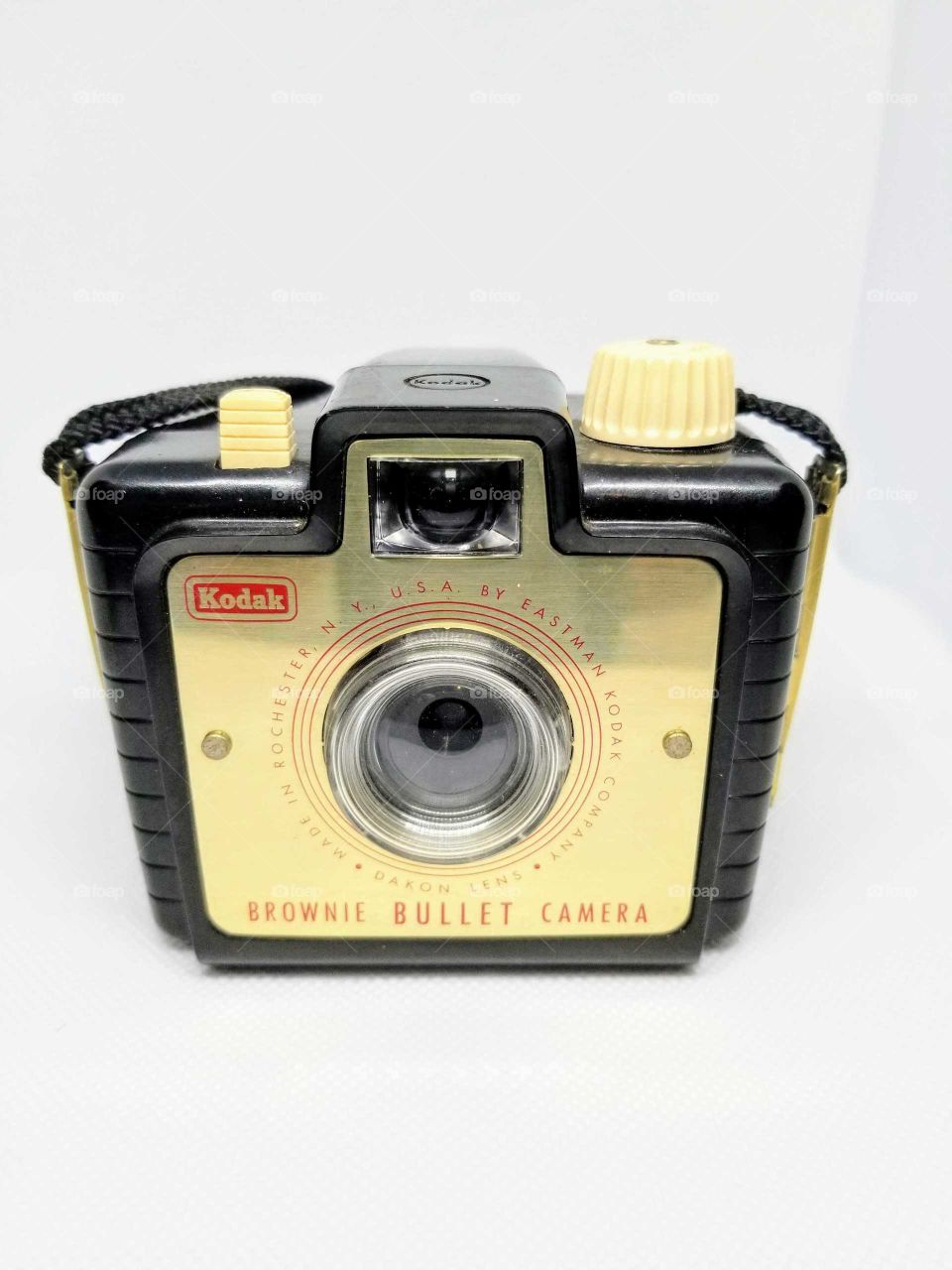 Kodak Brownie Bullet camera from 1960's has a nice gold front plate and bakelite body.