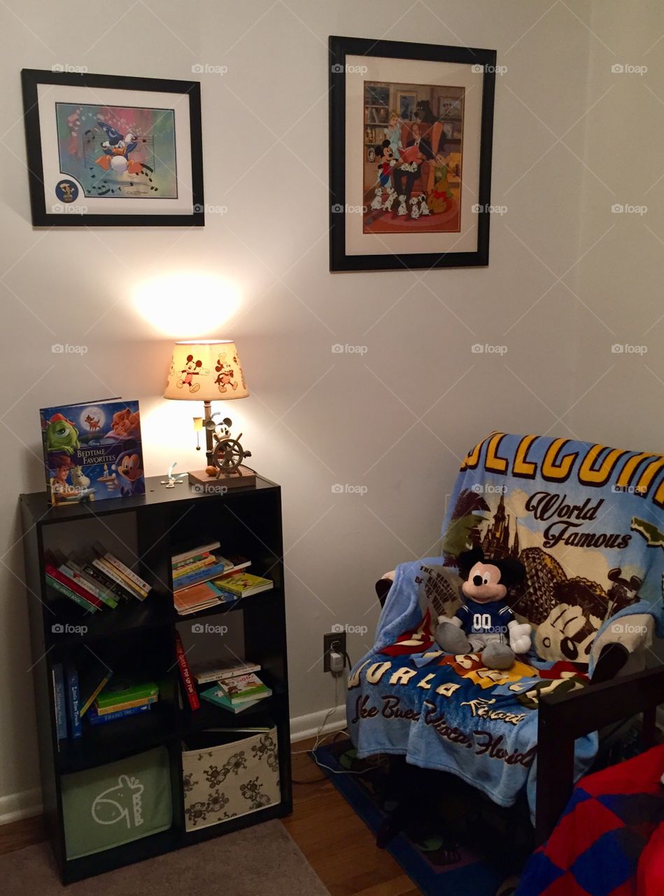 Disney themed reading nook in a child’s room/nursery helping to promote good habits by introducing books and daily story time at an early age 