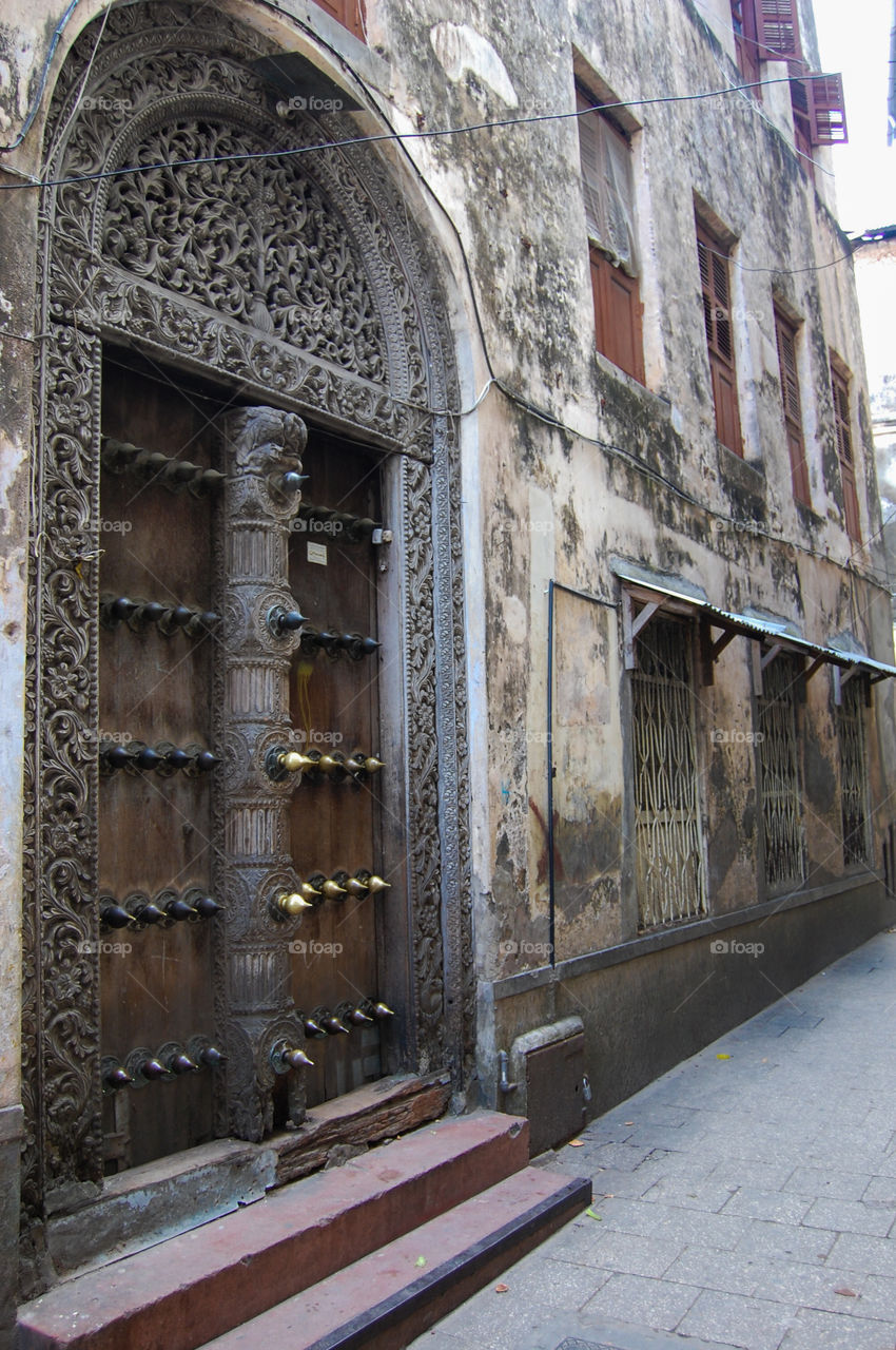 Old worn door in Stonetown on Zanzibar.