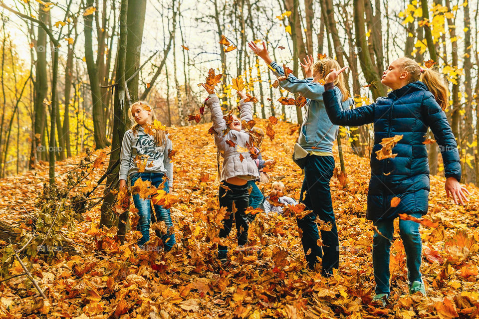 Kids in the autumn park
