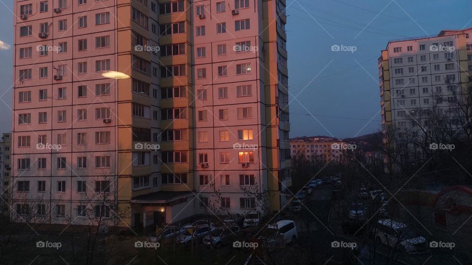 Pink block of flats in the late evening, Russian aesthetic