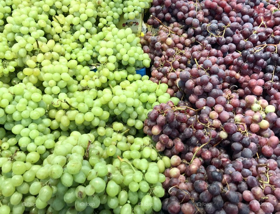 dark green grapes in a street market