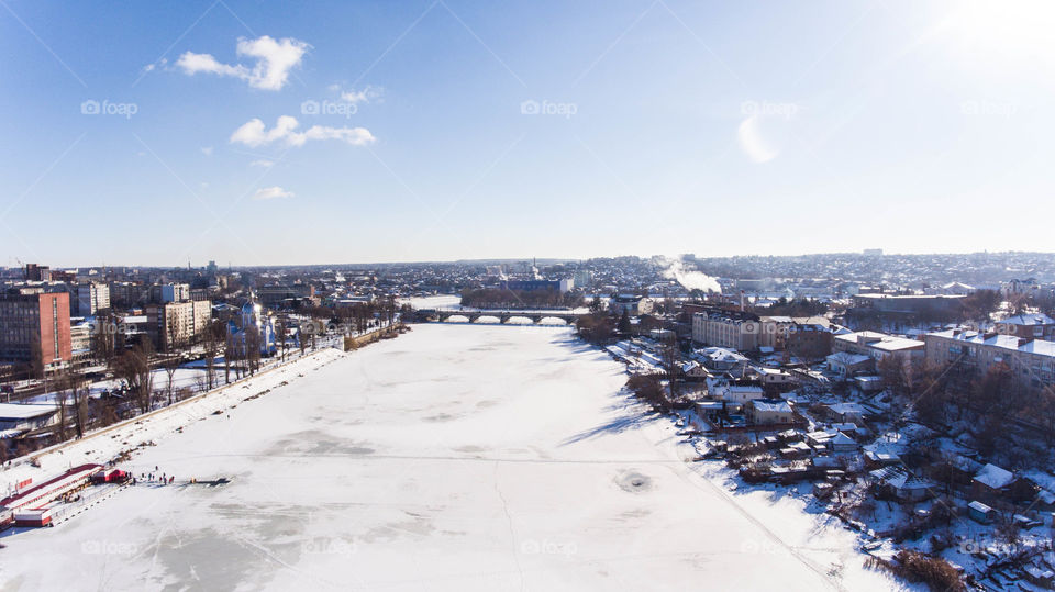 Frozen river in the city