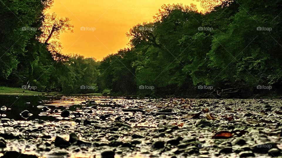 Midwestern prairie sunrise view from river bed 