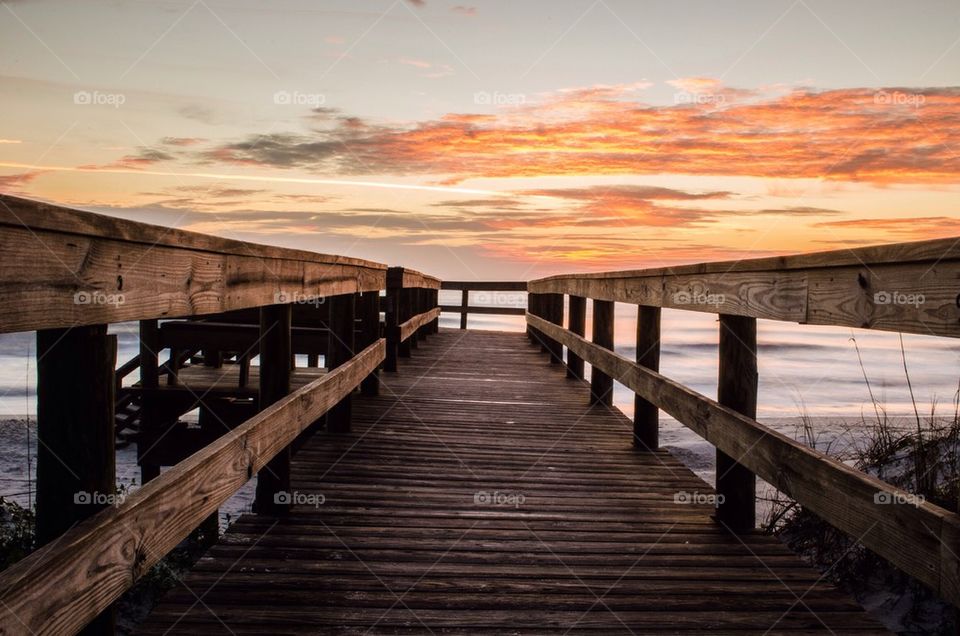 View of empty wooden bridge