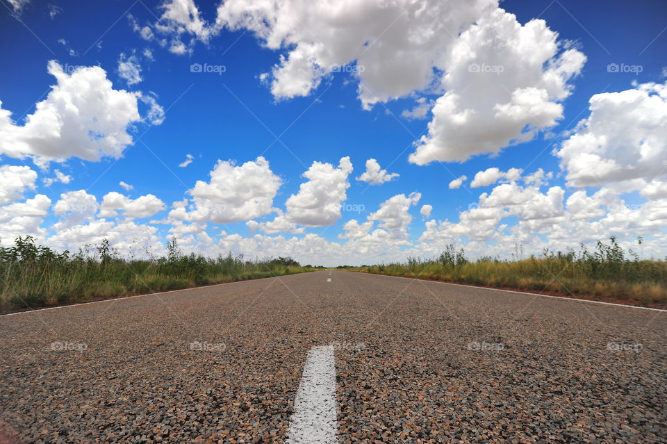 View of road and clouds