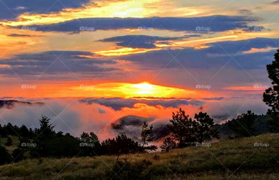 sunset clouds mountain top