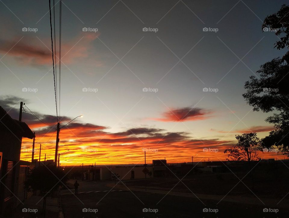 A show of colors in the sky announcing the dawn.