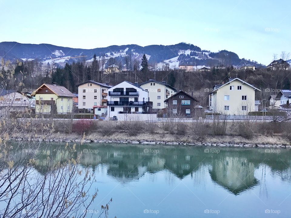 Houses in front of a river in Austria 