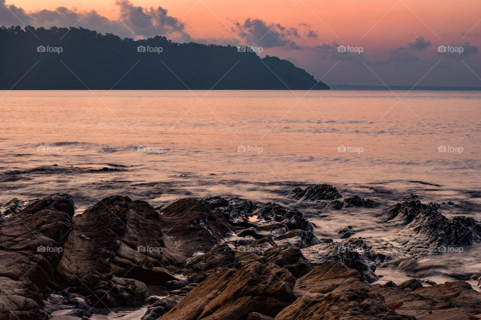 Rocks in the horizon's gold
