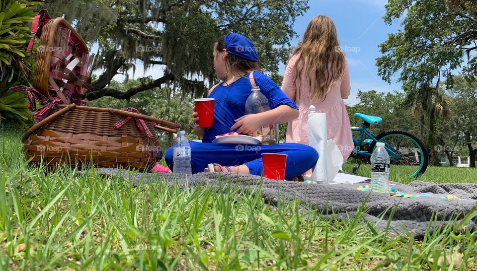 Picnic Basket Opened Up With Food And Items Needed For The Picnic Meal As A Family With Our Girls Excited To To Eat And Enjoy In The Urban Nature.