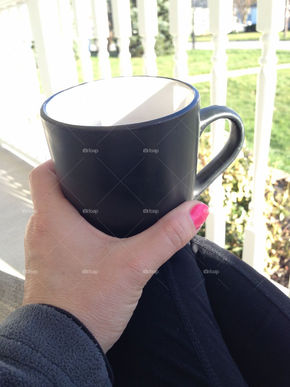 Tea on a front porch swing