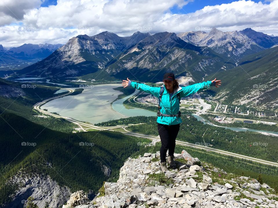 Young woman standing on hill