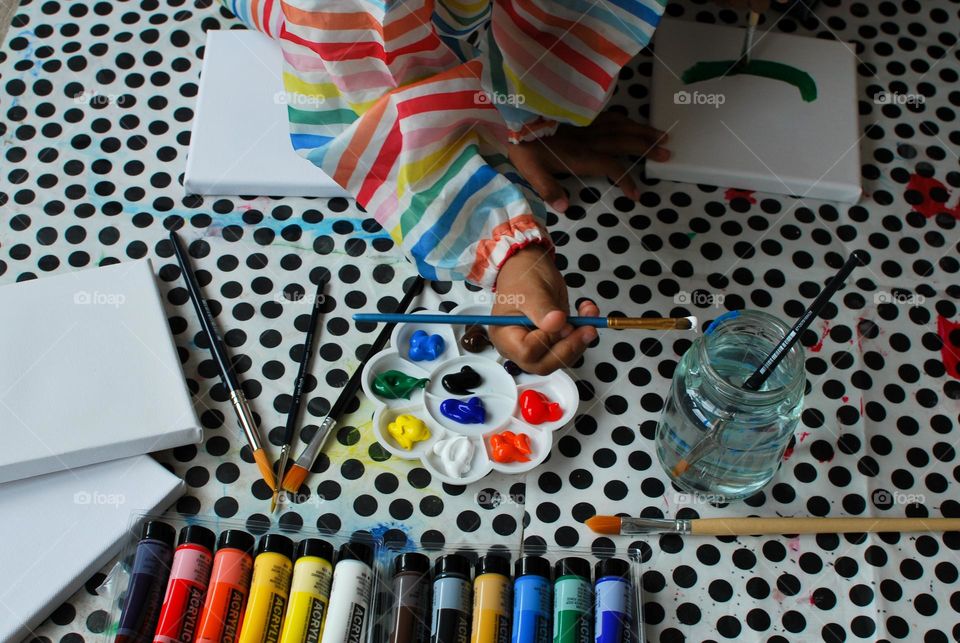 Little girl of mixed race painting