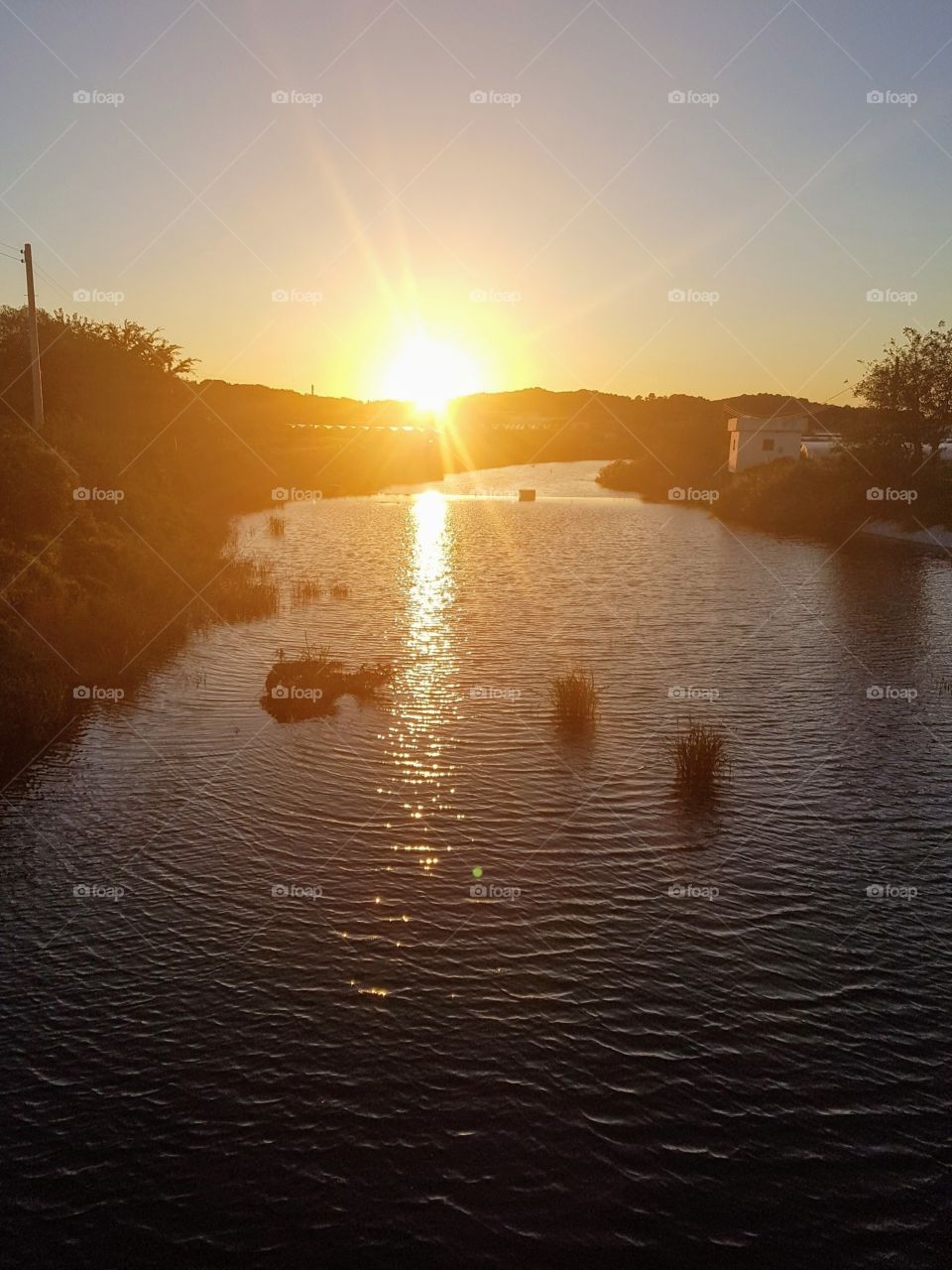 The Sunrise at Ansong River South Korea. 

at the river you can see the bright reflection of the sunlight.