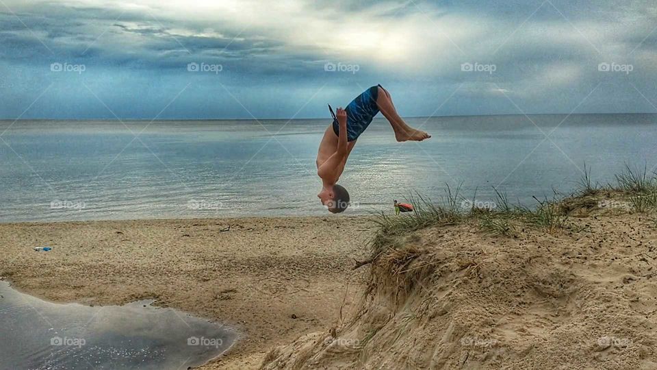 Backflip layout at the beach