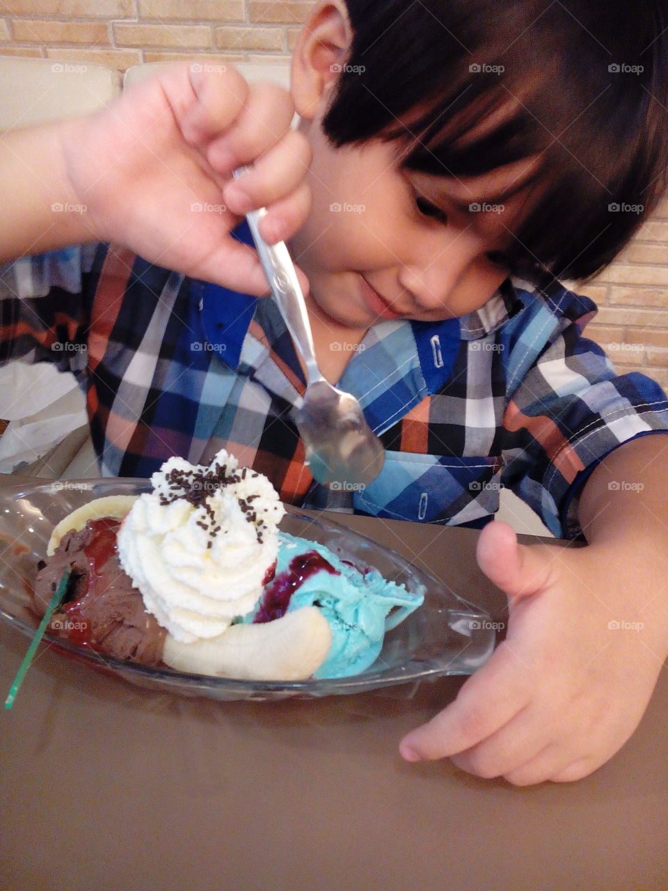 kid enjoying ice-cream. Thitiwin eat sweet
