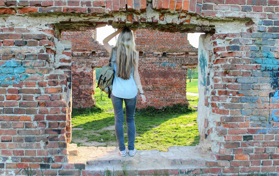 girl from the back at the ruins