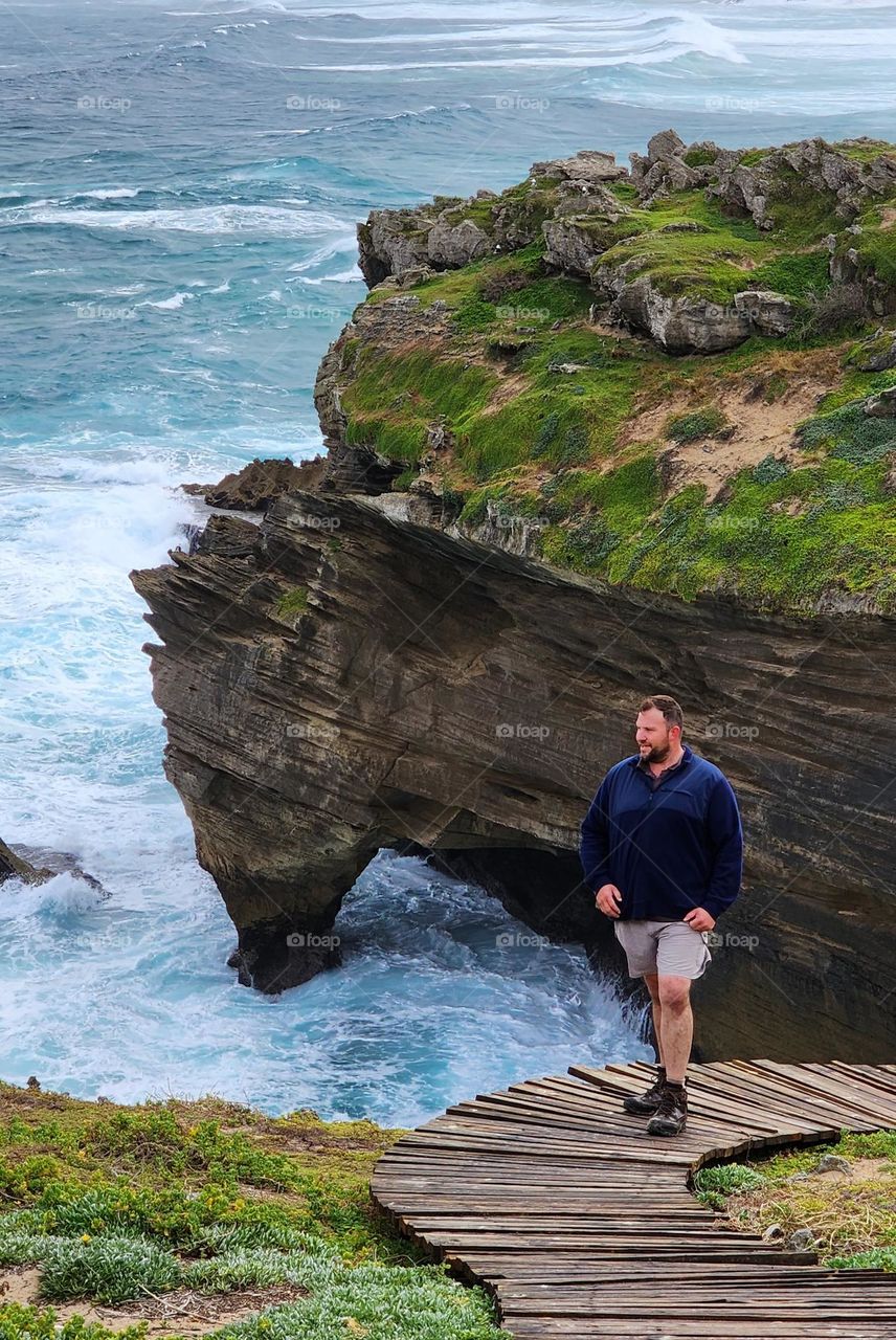 Talking in the beautiful breathtaking scenery at Robberg Nature Reserve, South Africa