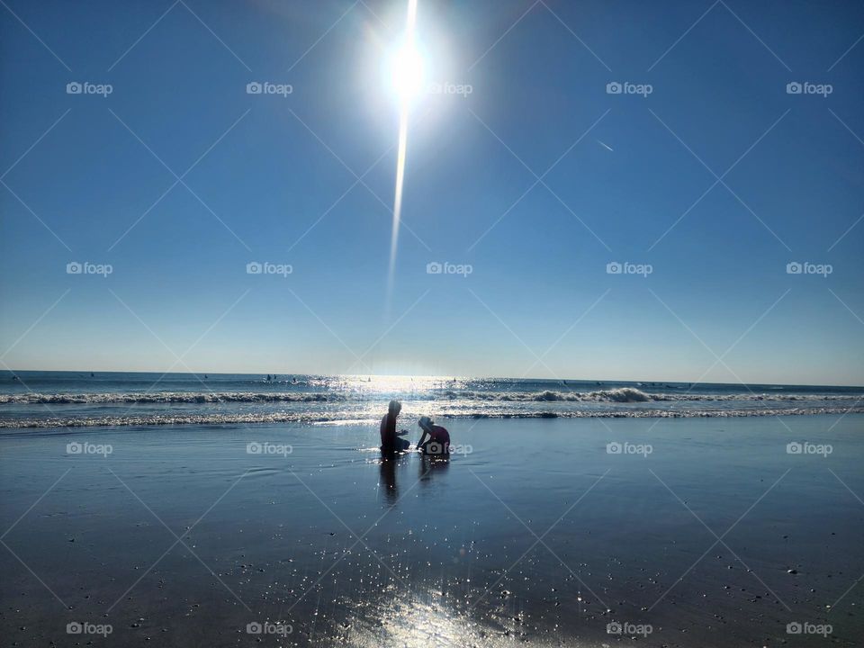 kids playing on the beach