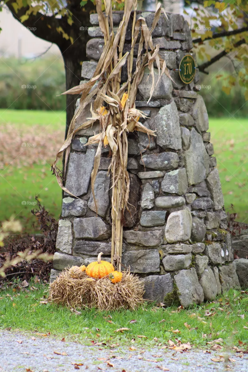 Stone Pilar Decorated for Fall