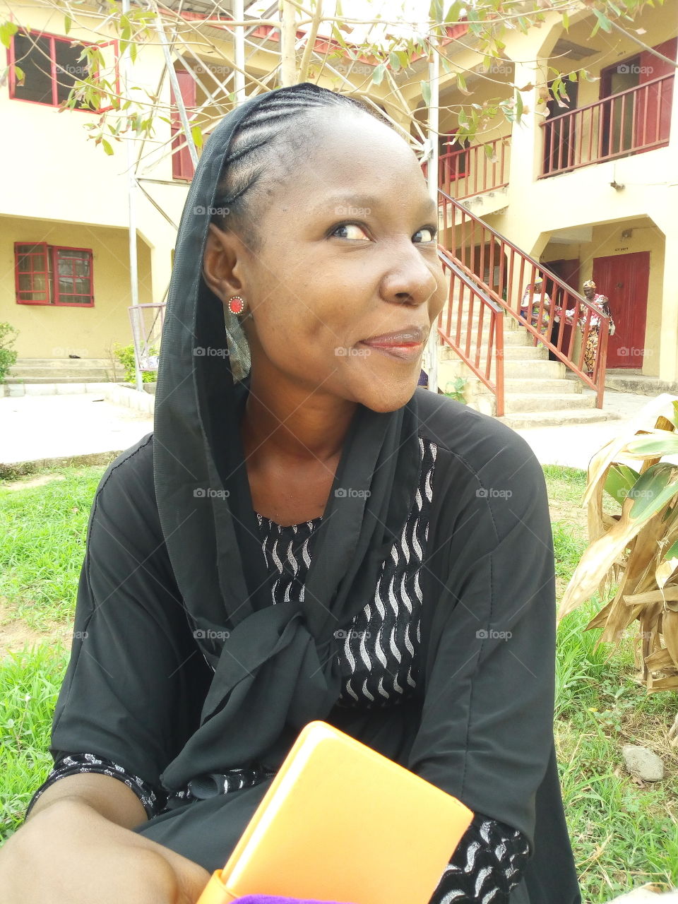 adult acting like kids, one side look at the wall, seated at a nursery and primary school.
