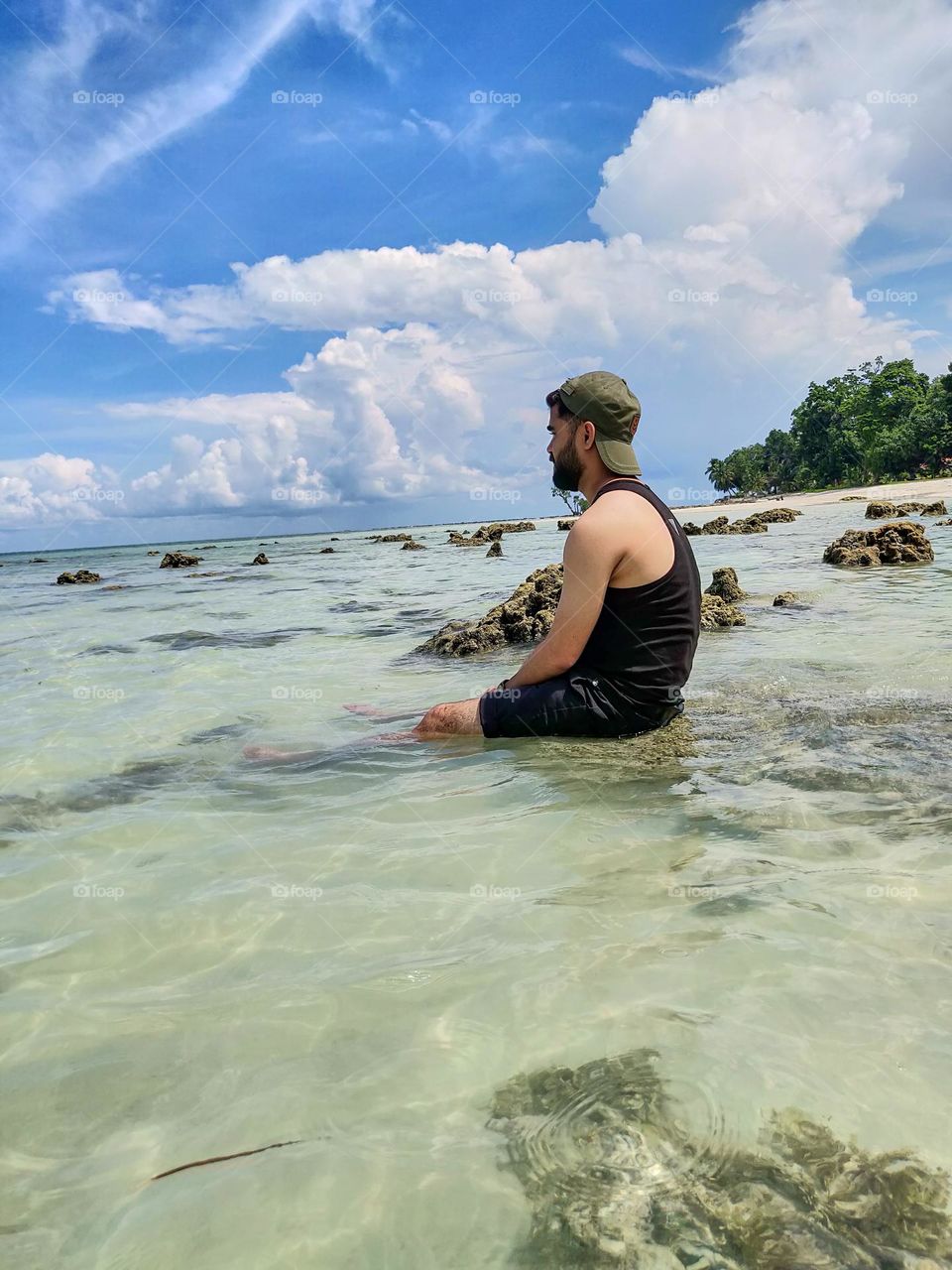 chilling in cold water under scorching sun