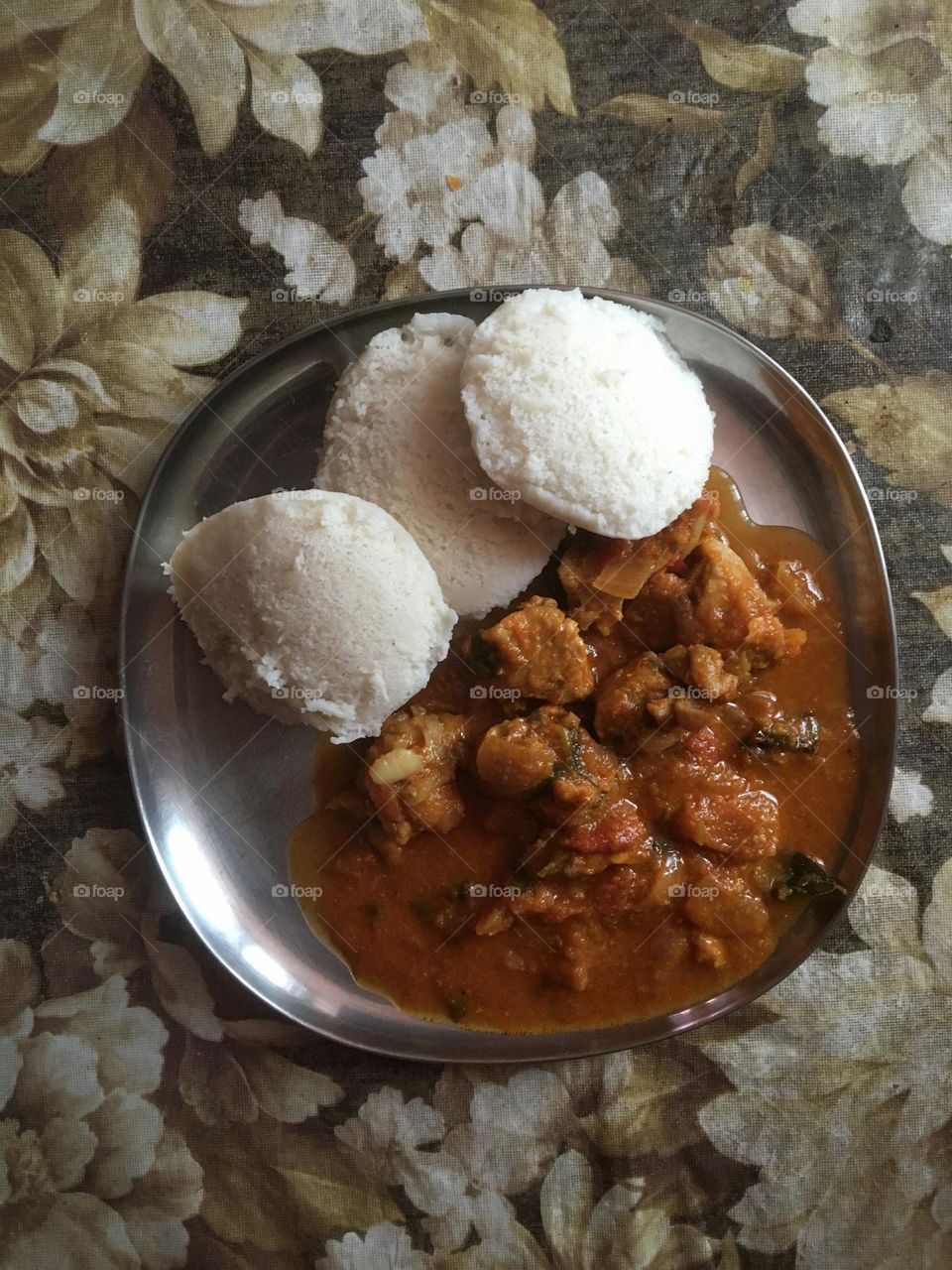 South Indian Breakfast Idly with chicken curry