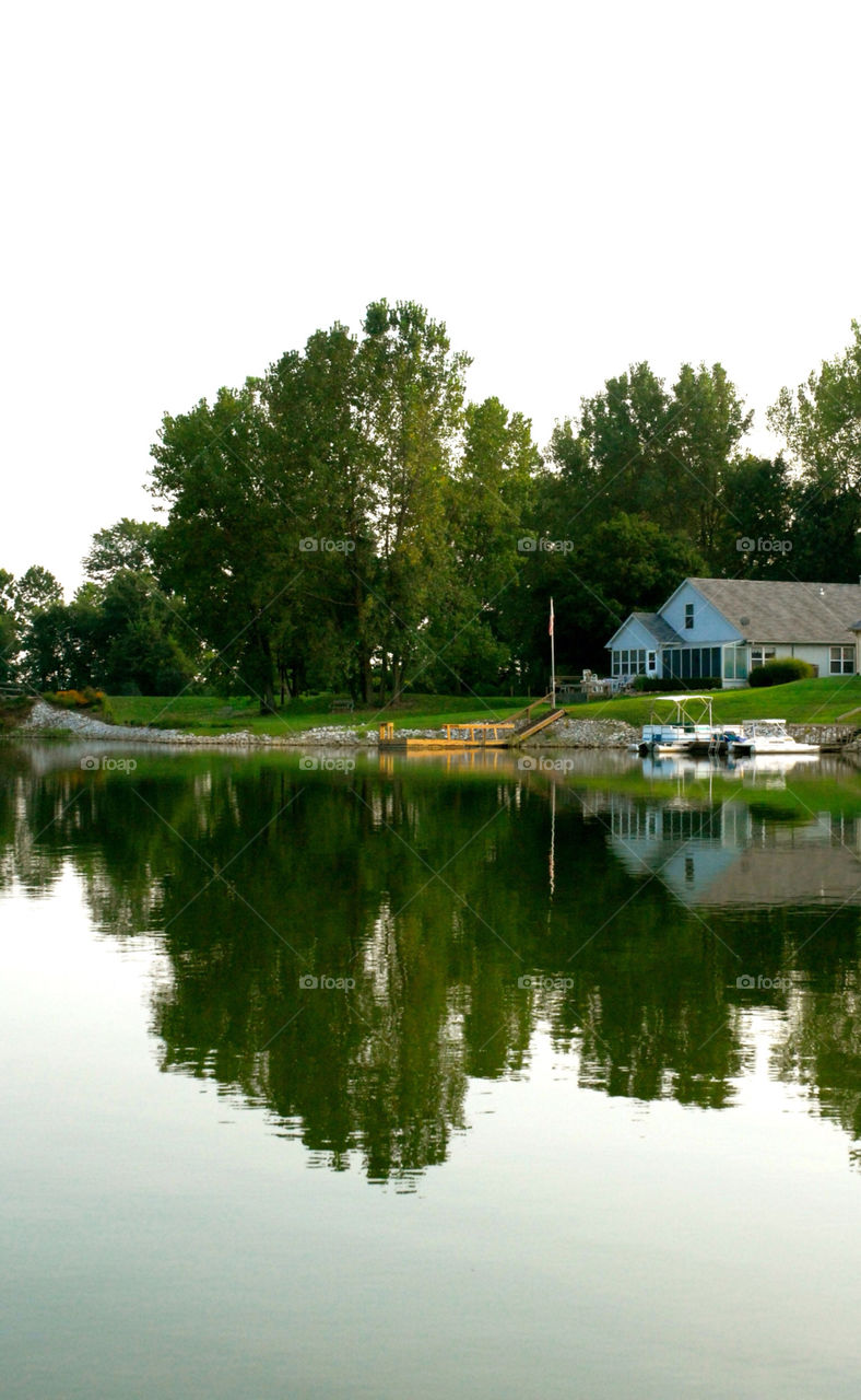 tree lake house boat by refocusphoto