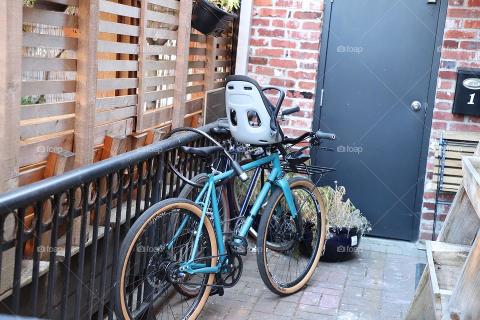 bike parked in front of a door