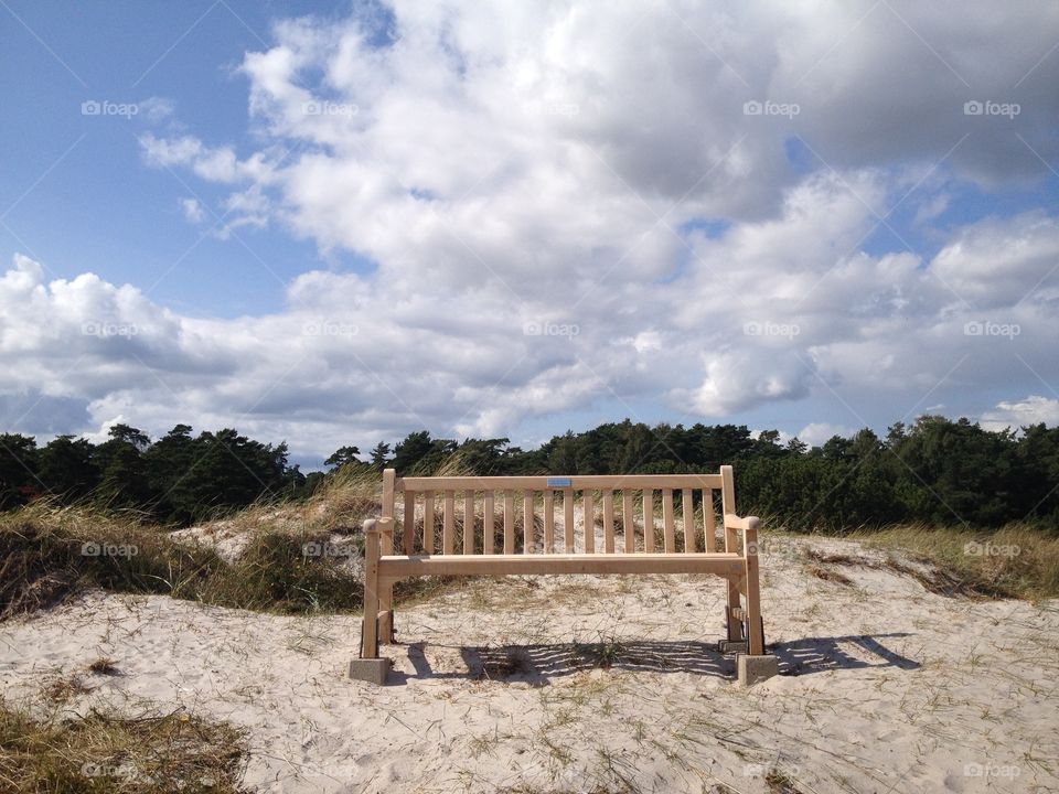 Empty bench on the beach in Falsterbo in Sweden